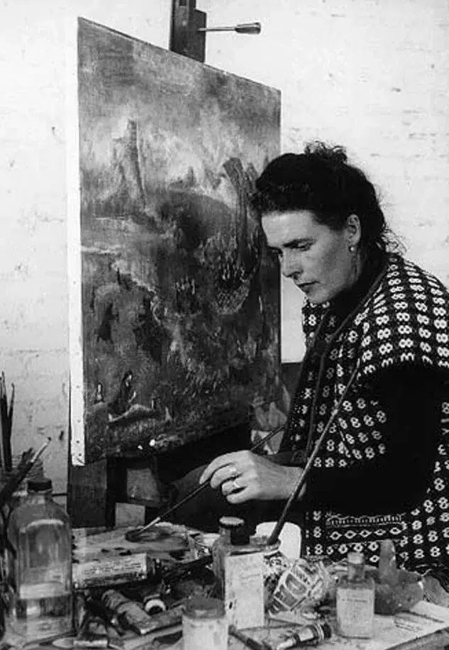 Leonora Carrington painting at her studio