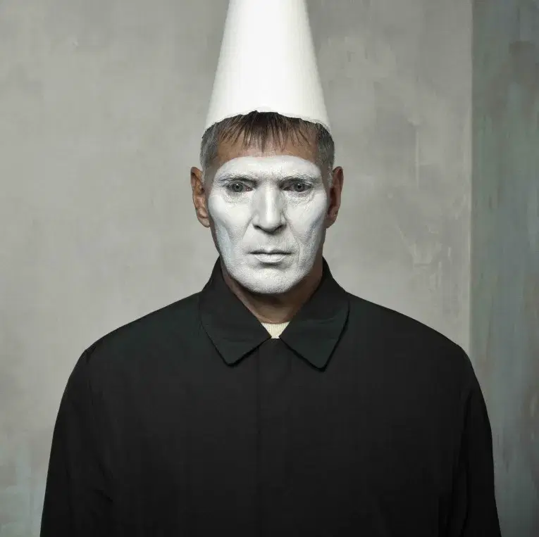 Work from Erwin Olaf with white painted face and hat
